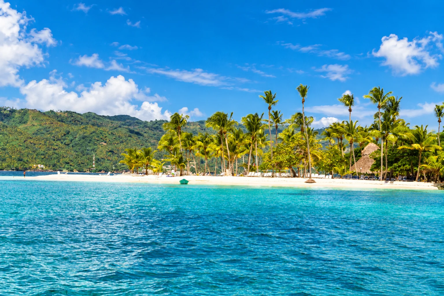 Palm-lined Cayo Levantado beach seen from the water — Cayo Levantado, AI-enhanced archival photograph