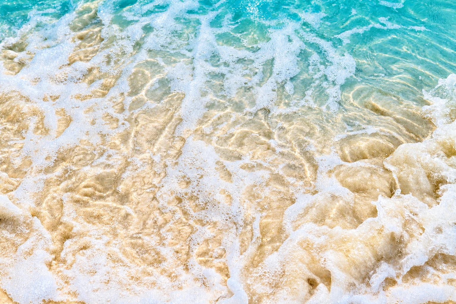 Sunlit foam and clear water over sand — Cayo Levantado, AI-enhanced archival photograph