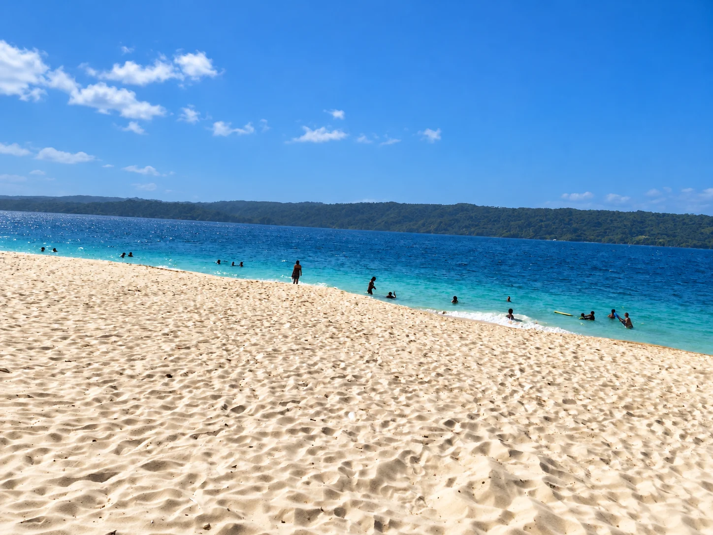 A broad sandy beach facing the Samaná hills — Cayo Levantado, AI-enhanced archival photograph